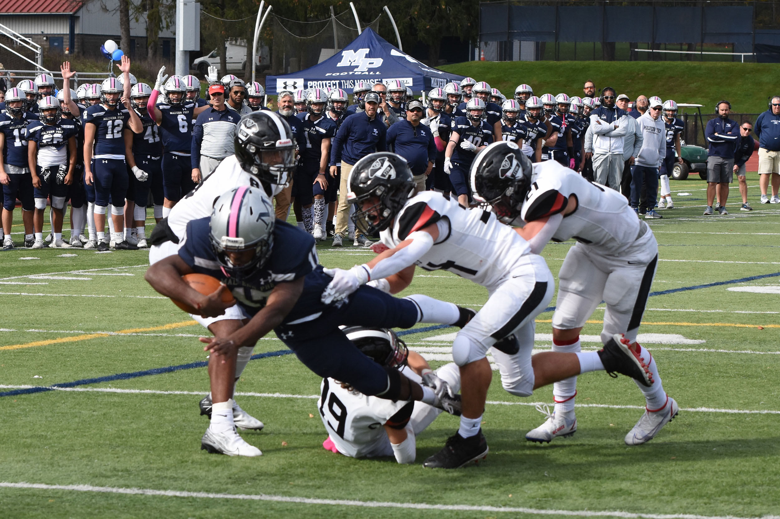 Malvern Prep Football making the tackle