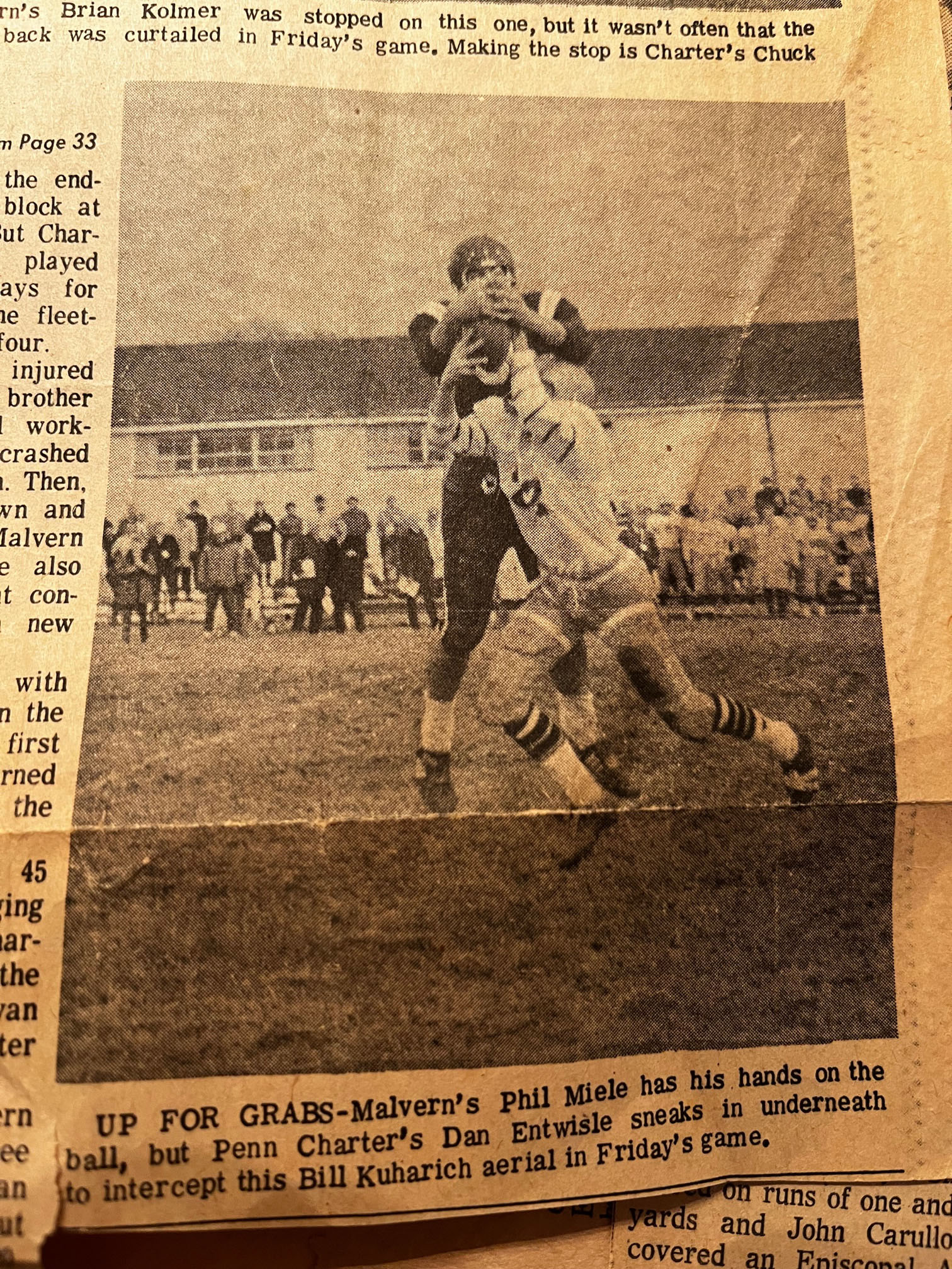 Malvern's Phil Miele has his hands on the ball, but Penn Charter's Dan Entwisle sneaks in underneath to intercept this Bill Kuharich aerial in Friday's game.