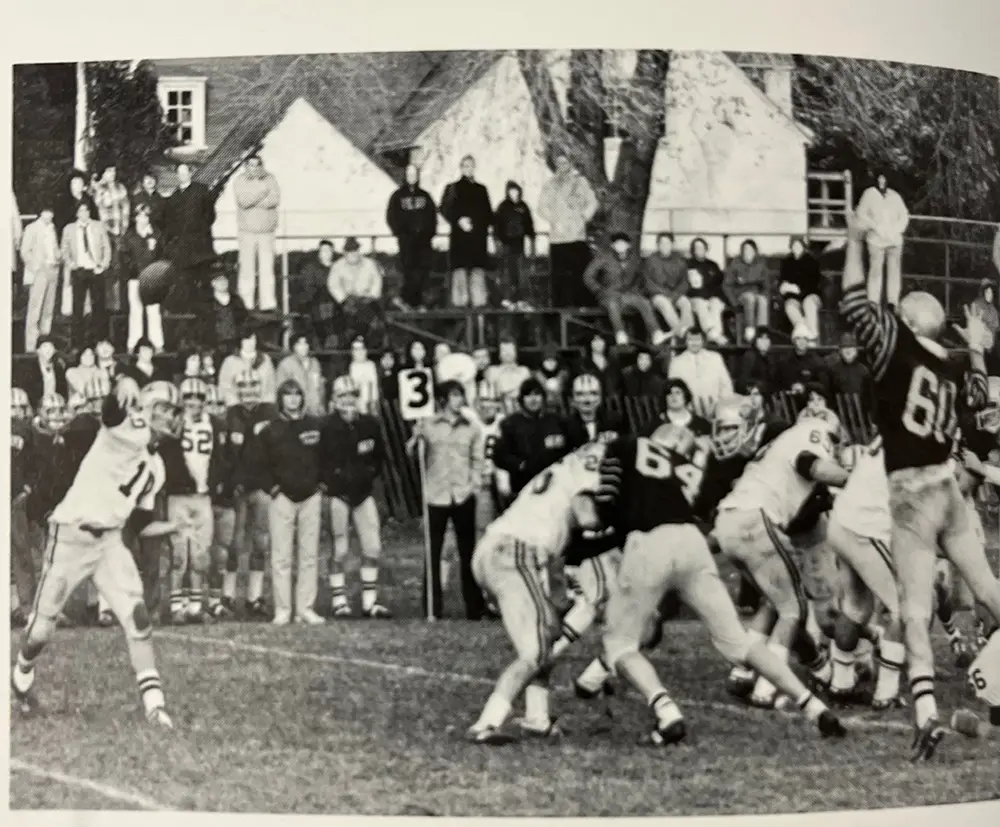 Malvern QB throwing the ball against the defense