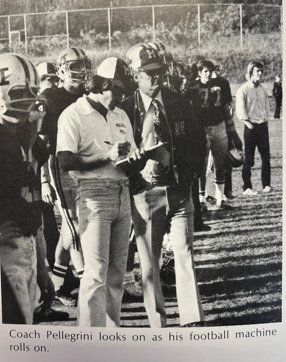 Coach Pellegrini lools on as his football machine rolls on