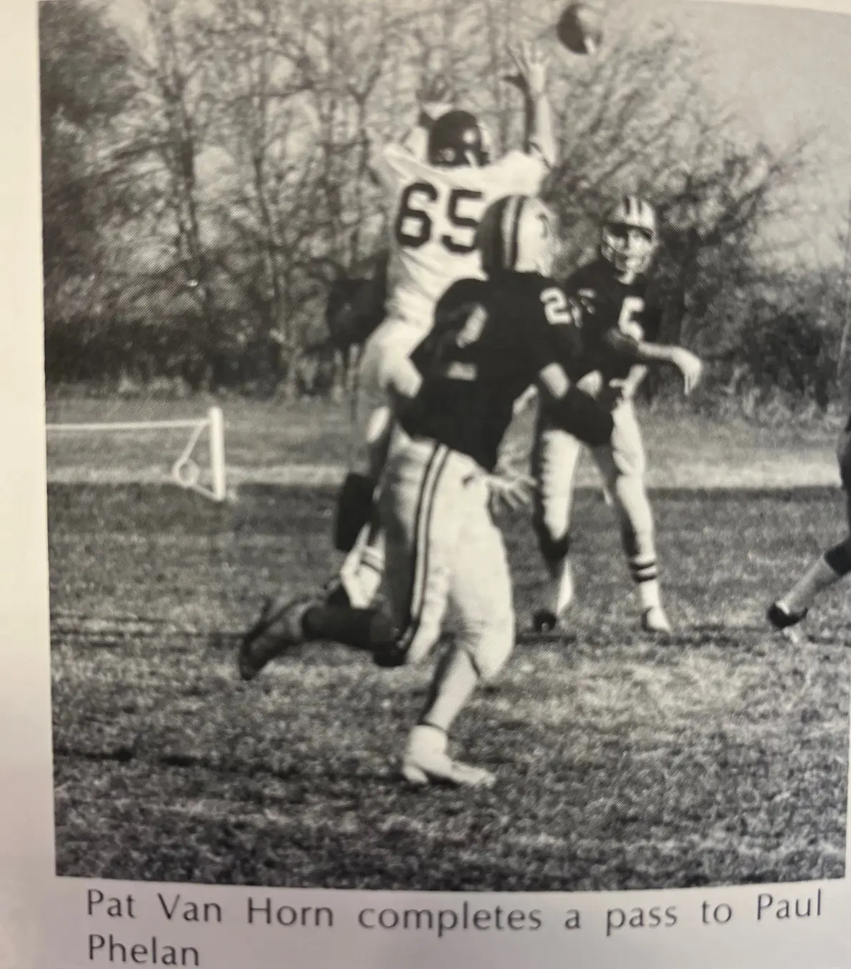 Pat Van Horn completes a pass to Paul Phelan